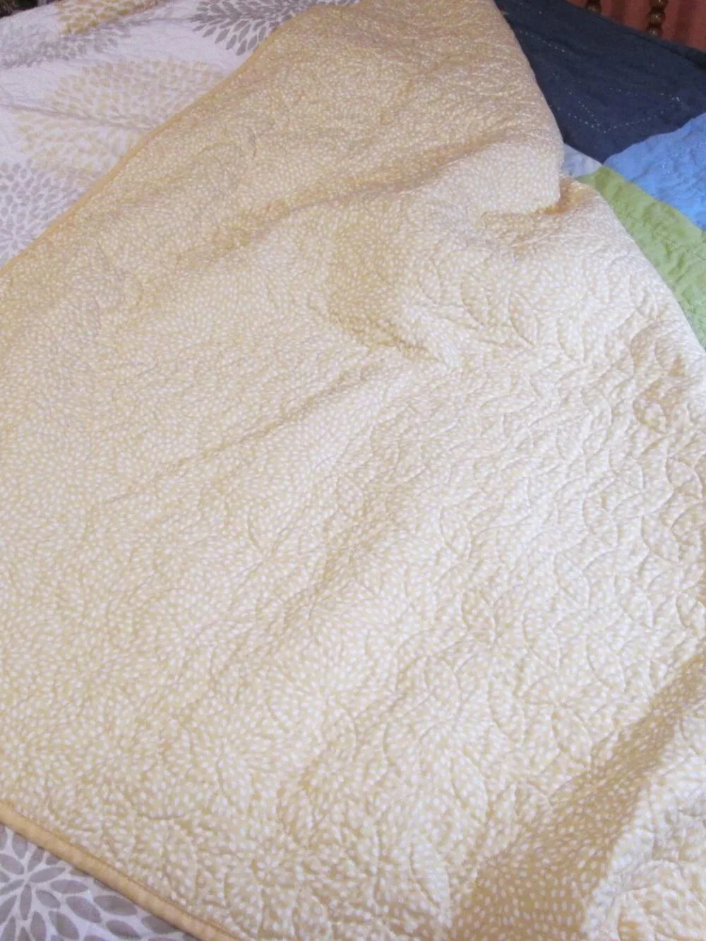 The big one bold medallion quilt yellow gray reversible to tiny polka dot yellow